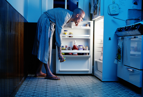 getty_rm_photo_of_man_looking_in_refrigerator.jpg